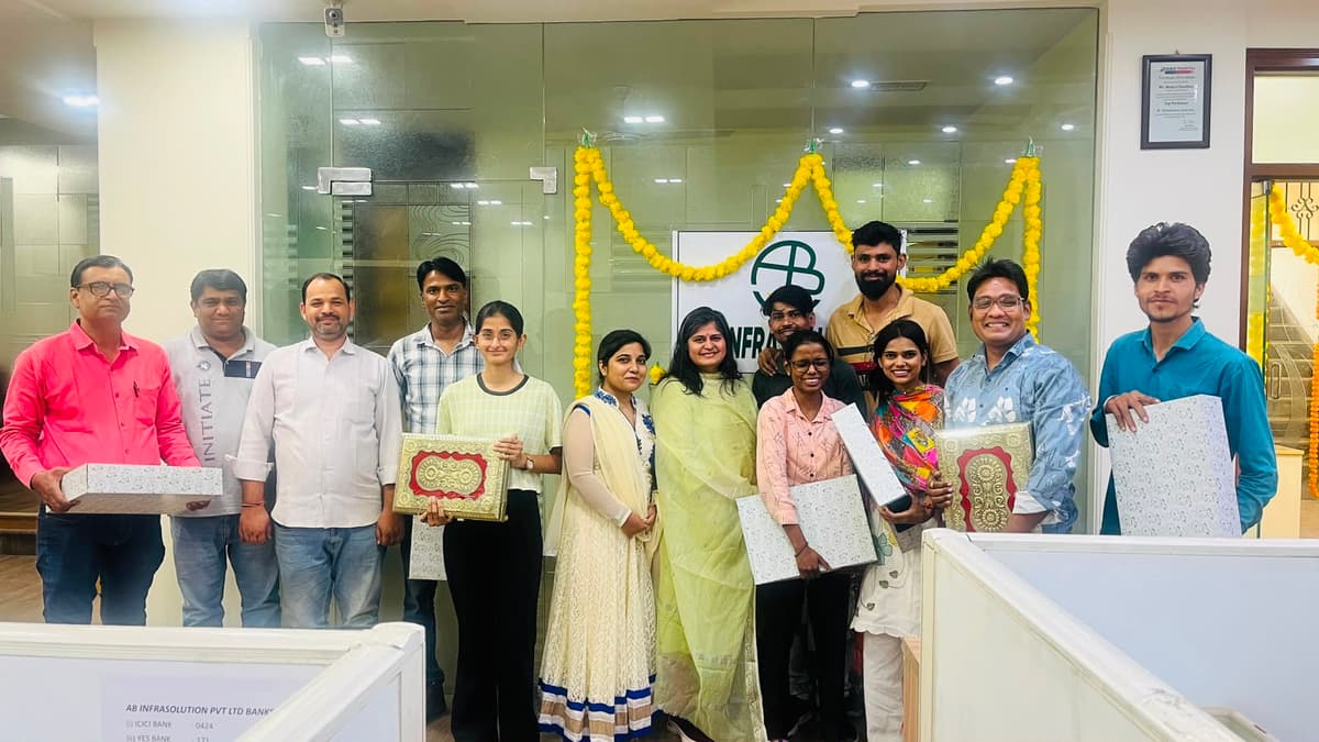 Colleagues celebrating a milestone at AB Infra