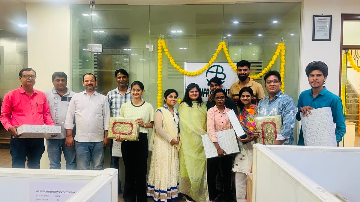AB Infra team members during an office celebration